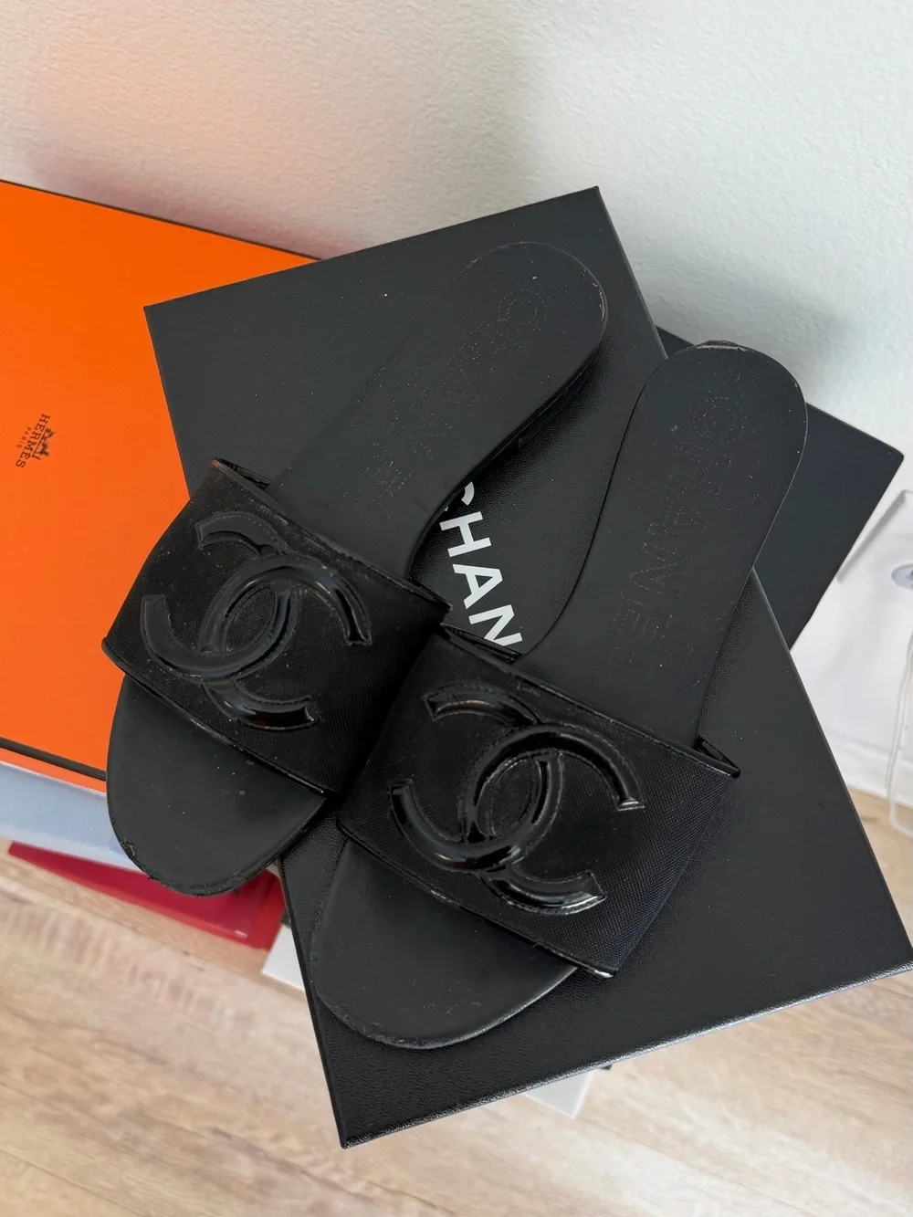 CHANEL Black Slide Sandals with Raised CC Emblem - Picture 2 of 8